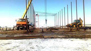 Аренда экскаватора погрузчика с ямобуром в Прокопьевск цена от 1572 руб