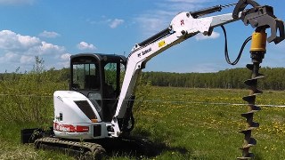 Аренда экскаватора погрузчика с ямобуром в Прокопьевск цена от 1572 руб